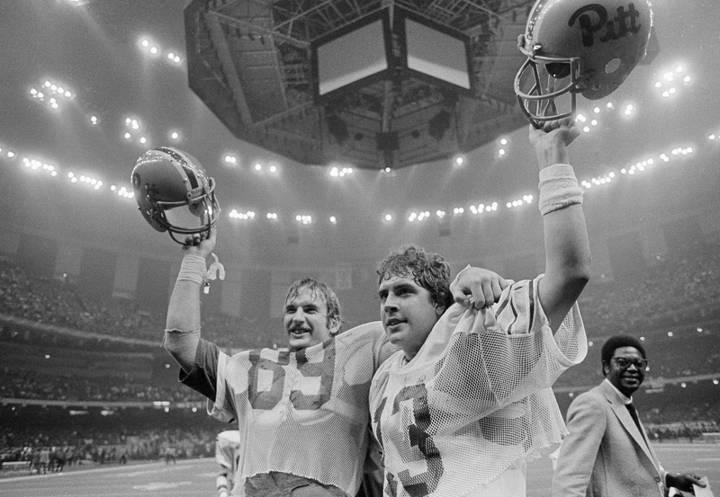 John Brown and Dan Marino celebrate after Pitt’s 1982 Sugar Bowl win. AP Images